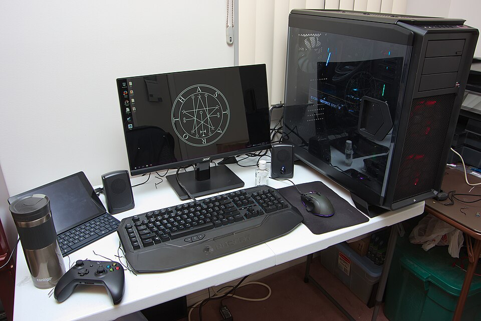 Custom-built gaming PC with RGB lighting and liquid cooling system