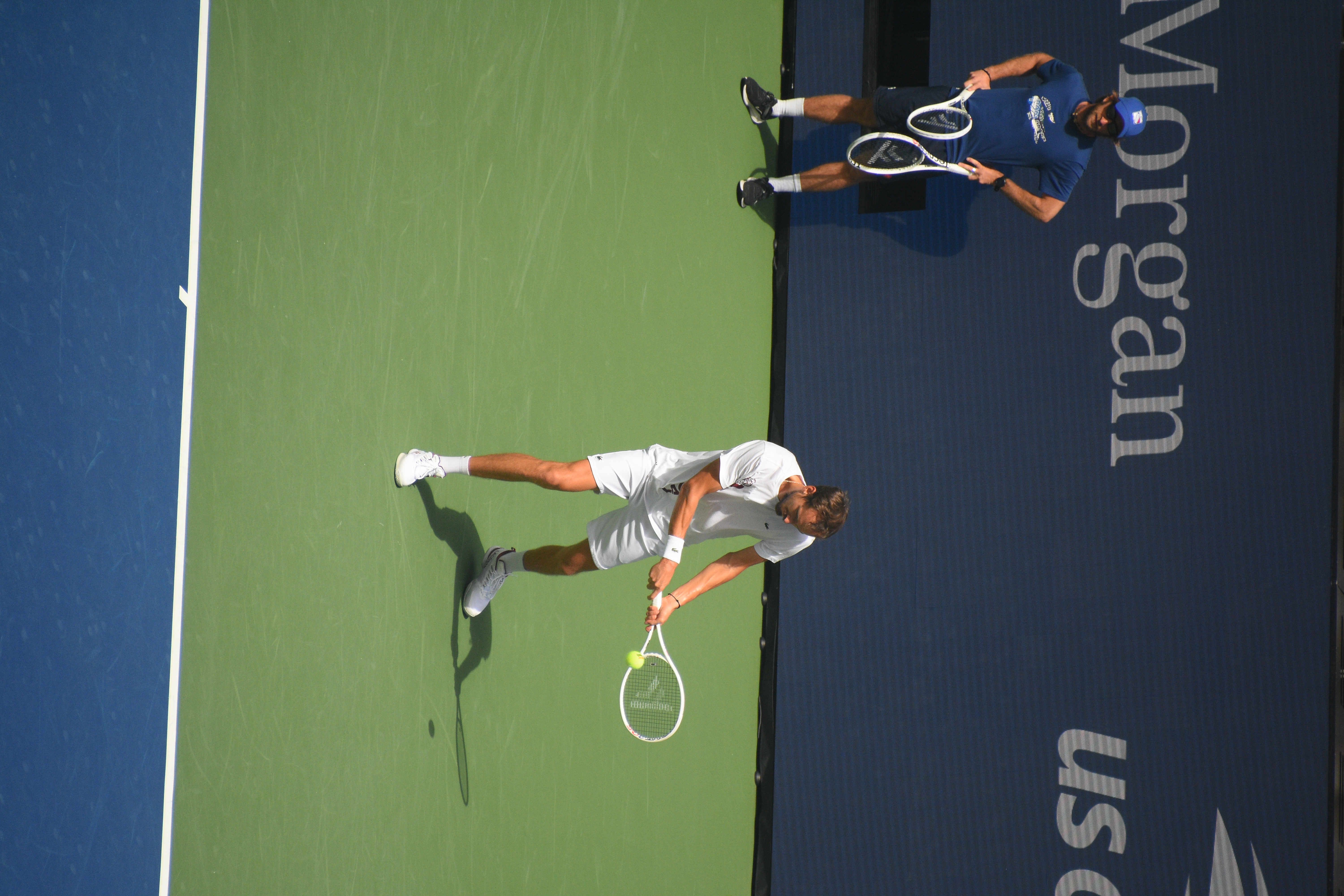 Daniil Medvedev practicing tennis on a hard court