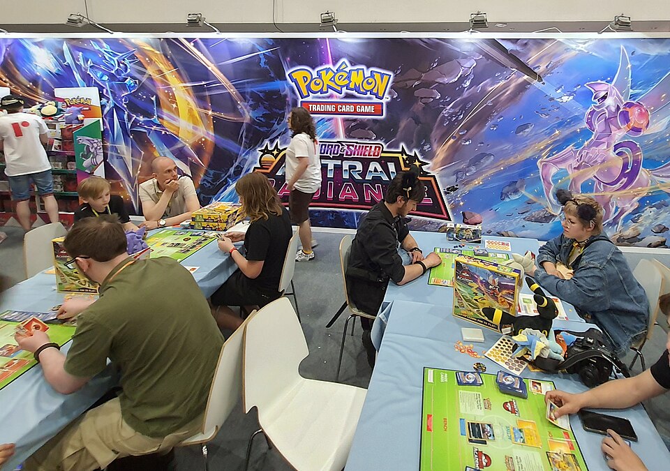 Pokémon Trading Card Game event at Pyrkon convention with players at tables